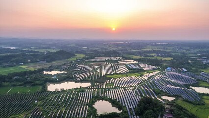 time lapse of solar power panels at sunset