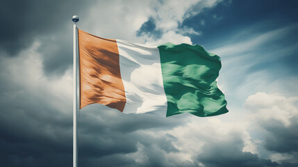 Irish flag waving for St. Patrick's Day celebration - obrazy, fototapety, plakaty