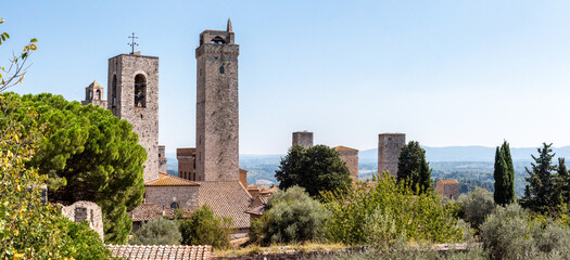 The towers Cugnanesi and Becci in San Gimignano - obrazy, fototapety, plakaty