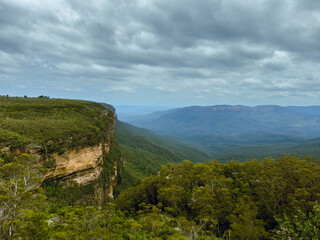 Fototapeta na wymiar The serene Blue Mountains and Majestic Waterfalls. Nature's Symphony. NSW. Australia. Minnehaha falls. Three sisters.