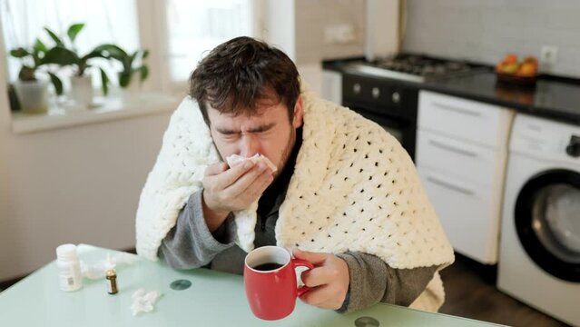 Coughs and Sneezes Young Man Struggling with Seasonal Flu