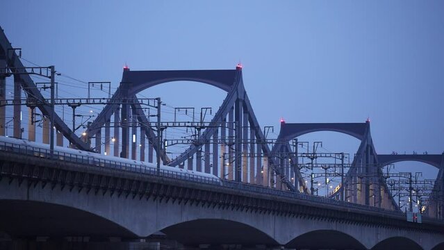 high speed train through steel bridge