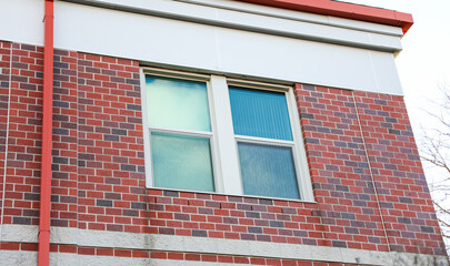 urban brick building, symbolizing stability and growth in commercial real estate