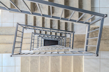 Fototapeta premium steps, stairs going down. the concept of time and its cycle of motion. Abstract spiral fractal