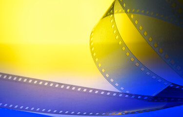 yellow-blue background with film strip
