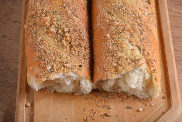 Baked wheat bread with herb seasoning seasoned baguette