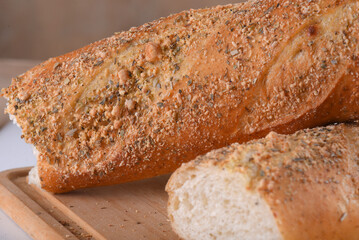 Baked wheat bread with herb seasoning seasoned baguette