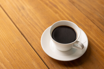 Cup of hot coffee on a table,