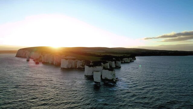 Aerial Drone View of Old Harry Rocks at sunset. View of Studland Bay, Handfast point of the Dorset coastline in England