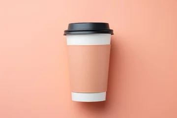 Fotobehang Pantone 2024 Peach Fuzz Mockup of a coffee cup in a trendy color. Background with selective focus and copy space