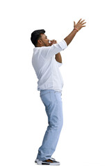 A man in a white shirt, on a white background, in full height, screams, in profile
