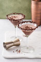 Chocolate martini in glasses with chocolate sprinkles on rim