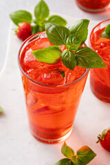 Strawberry basil spring cocktail in a tall glass