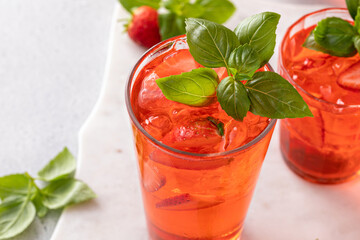 Strawberry basil spring cocktail in a tall glass