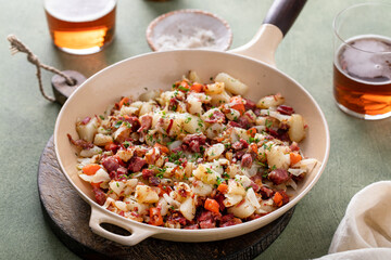 Corned beef hash with potatoes and carrots