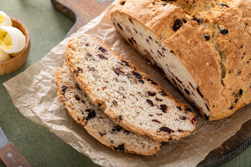Irish soda bread sliced on a board, traditional recipe