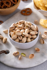 Salted pistachios with other salty snacks usually served with beer