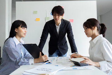 analyst team is doing teamwork and brainstorming about new strategy project at the meeting room.