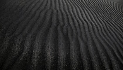Black sand dunes in the desert.