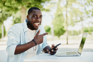 Young man smile adult technology male happy laptop person computer lifestyle