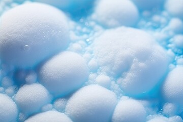 Blue bubbles in soapy foam with a space for writing.