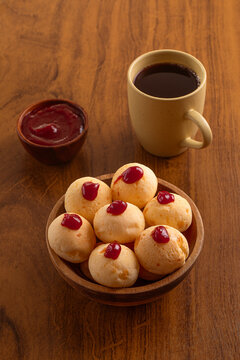 Cheese breads bowl with grava creem drops on top. Black coffee. Brazilian snack.
