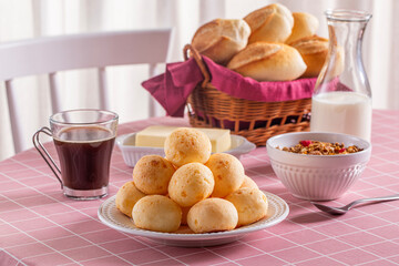 Boho Breakfast table. Typical Brazilian breakfast. Pão de Queijo. Black Coffee. Butter toast. Granola.