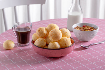Boho Breakfast table. Typical Brazilian breakfast. Pão de Queijo. Black Coffee. Butter toast. Granola.