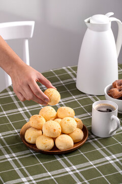 Boho Breakfast table. Typical Brazilian breakfast. P&atilde;o de Queijo. Black Coffee. Butter toast. Granola.