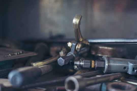 Mechanic Tools Engineering Equipment Car Auto Repair Shop With Copy Space. Blurred Background Mechanical Service. Heavy Screw Grungy Rusted Wrenches Dirty Screwdriver Object. Industrial Hardware Set