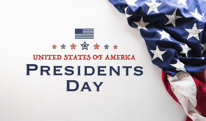 Happy Presidents day concept made from American flag and the text on white wooden background.