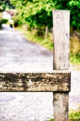 Menthon Saint Bernard, France - August 29 2020 : a close up of a wooden fence on the hiking trail in a small village at lake Annecy