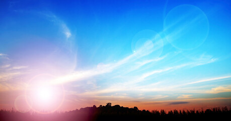 Obraz premium Image of the brightness and beauty of nature when the sun shines on the blue sky and white clouds.
