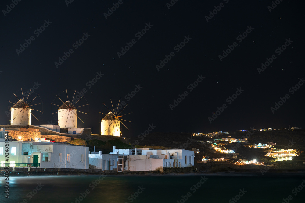 Poster Windmills of Mykonos island at night. Greece