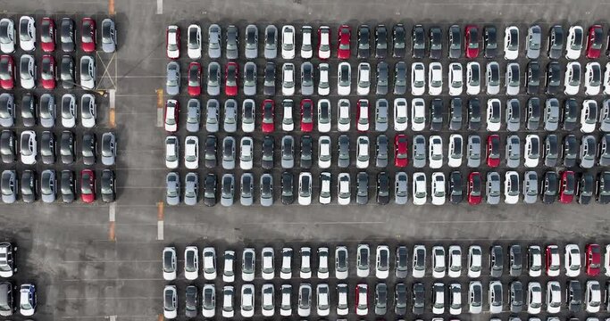 Aerial view of a big parking lot full of new cars perfectly aligned at the Georgia Ports Authority and International Auto Processing.