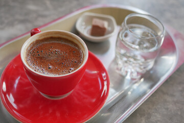 a cup of turkish coffee on table 