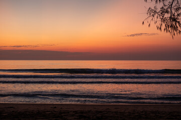 Morning seaside with twilight light. Ocean waves.