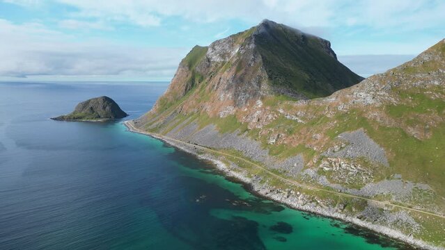 Lofoten Islands Steep Mountain Coastline near Haukland Beach - Aerial 4k