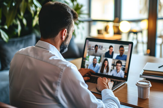 professional man having online business meeting on laptop computer