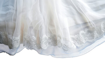 close-up of the bottom part of a white wedding dress