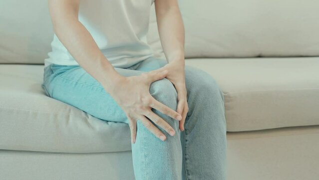 woman having knee ache and muscle pain due to Runners Knee or Patellofemoral Pain Syndrome, osteoarthritis, arthritis, rheumatism and Patellar Tendinitis. medical concept