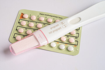 Pregnancy test and birth control pills, contraception health and medicine.
