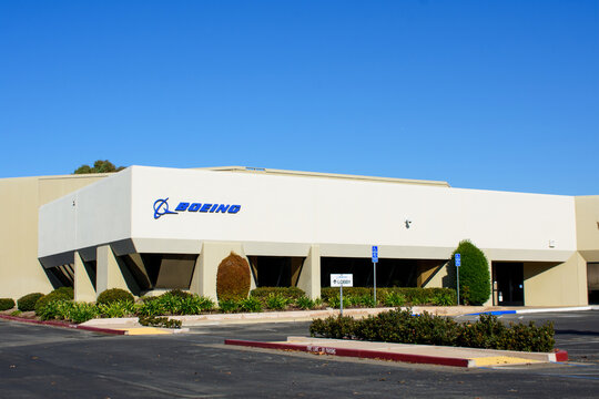 Boeing logo, sign on company office. The Boeing Company is an American multinational aerospace corporation. - Pleasanton, California, USA - November 22, 2020