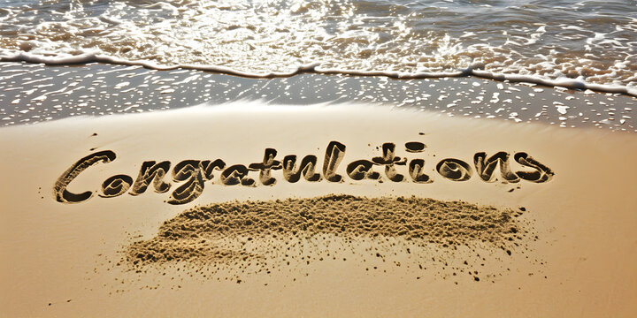 congratulations inscription on the beach sand