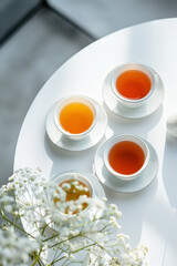 Obraz na płótnie Canvas Minimalistic tea ceremony, warm light, modern style, for spa and relaxation