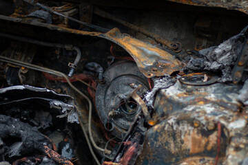 Dnepr, Ukraine – January 6: Russian drones attacked the Dnieper. Burnt and damaged cars in the Dnieper. Utility services clean up the aftermath of the attack on the city.