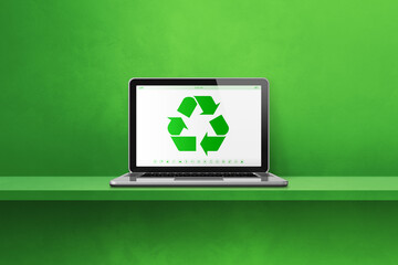 Laptop computer on a shelf with a recycling symbol on screen. environmental conservation concept