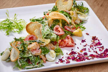 caesar salad on white plate
