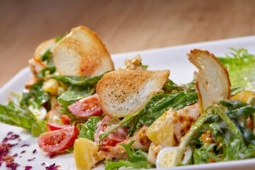 caesar salad on white plate