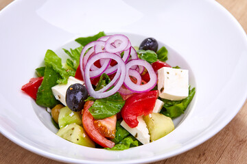 greek salad on the white plate